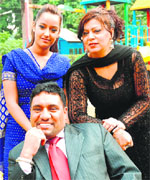 T.P. Sindra with the cast of the play