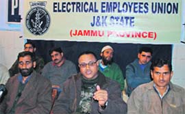 Officials of the J&K Central Non-Gazetted Electrical Employees Union address a media conference in Jammu on Monday.