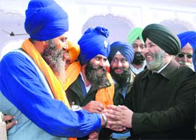 Dr Daljit Singh Cheema, SAD candidate from Anandpur Sahib parliamentary seat, being greeted by supporters in Mohali