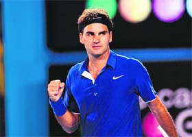 Roger Federer reacts after defeating Andreas Seppi during their game on the opening day of the Australian Open