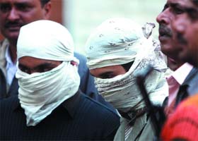 Harpal and Nader at the Hauz Khas police station in New Delhi