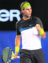 Rafael Nadal gestures after victory in his mens singles match against Christophe Rochus on Tuesday. Nadal won 6-0, 6-2, 6-2.
