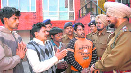 The four men accused of robbery in police custody at Sector 31, Chandigarh, on Wednesday.