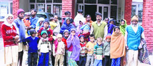 The bonded labourers who were released after a raid on a brick-kiln at Lalru on Wednesday.