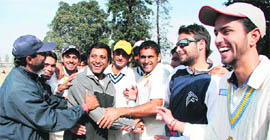 Punjab Ranji Cricket Player Ankur Kakkar (centre) being congratulated by his team mates as Kakkar was selected for North Zone team for Dilip Trophy at Ludhiana.