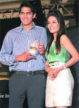 Ace boxer Vijender Singh and Bollywood actress Amrita Rao during the FHM Style Icons of the Year award presentation in Mumbai