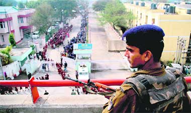 With Republic Day round the corner, a jawan maintains vigil outside MA Stadium in Jammu 