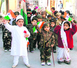 Children take part in ‘Patriotic Day’, organised at Everest Playway and Nursery School in Ludhiana on Friday.