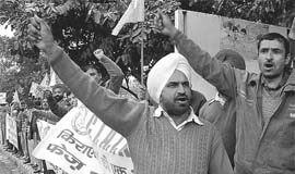 Members of the Chandigarh Industrial Area Tenants’ Association protest in support of their demand on Saturday.