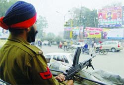 A policeman on guard on the eve of Republic Day in Amritsar. 