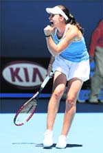 Marion Bartoli celebrates after beating Jelena Jankovic  in Melbourne on Sunday.