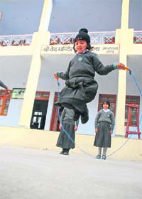 A girl plays at the Bal and Balika Niketan in the Ambphalla area in Jammu