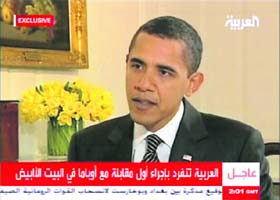 In an image made from a video provided by Al-Arabiya, President Barack Obama is interviewed in Washington by Dubai-based Al-Arabiya cable network