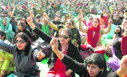 Teachers of universities and colleges of Punjab and Chandigarh at a rally in Sector 25, Chandigarh,