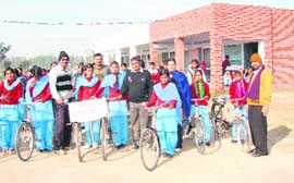 Students of Government High School, Shergarh in Kaithal district, get bicycles.