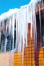 Icicles hang from the roof of a tourist building at a ski resort in Gulmarg