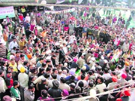 Congress workers stage a dharna against the MC in Ludhiana on Thursday.