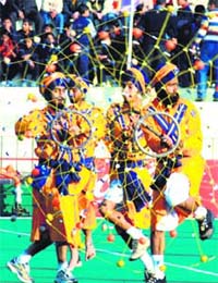 Nihangs perform gatka on the inaugural day of the Four-Nation Punjab Gold Cup Hockey Tournament in Sector 42, Chandigarh