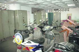 Vehicles parked in the basement of the MC building