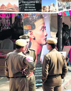 Police personnel guard the venue of the Surajkund Crafts Mela on Saturday.