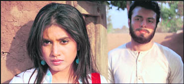 Nakul Vaid and Sonali Kulkarni in a still from Mazhar Kamrans directorial debut Mohandas