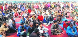 Vikram and bus drivers participate in the traffic awarness programme at Parade Ground, Dehradun, on Sunday. 