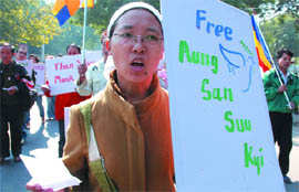 Pro-democracy activists of Myanmar clamour for the release of Daw Aung Suu Kyi and other political prisoners, at Jantar Mantar in New Delhi on Monday.