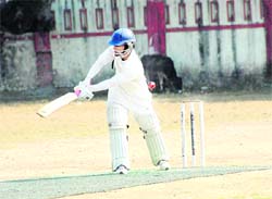An Abhimanyu Academy batsman hits a glance at the 57th District Cricket League in Dehradun on Monday.
