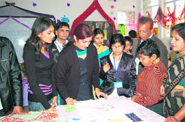 Visitors at an exhibition on fashion designing organised at MM PG College in Fatehabad.