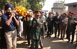 The body of Brigadier Bant Singh (retd) being taken to the cremation ground in Bathinda on Tuesday.