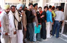 Youths queue up to purchase application forms for the posts of constable in the Punjab Police at the mini-secretariat in Bathinda on Tuesday.
