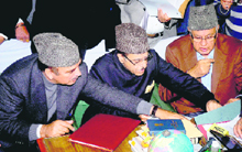 Congress leaders Ghulam Nabi Azad, Saif-ud-din Soz and NC patron Farooq Abdullah file their nimination papers for the Rajya Sabha elections in Jammu on Tuesday.