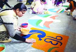 Students of the KMV College participate in a rangoli competition in Jalandhar.