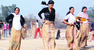 Students during the sack race at the Govt College for Women in Ludhiana.