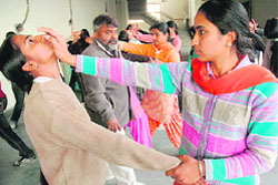 Sonsoi Rajiv Sinha, president of the Traditional Karate Federation of India, gives tips of martial arts to students of Government College, Sector 46, Chandigarh