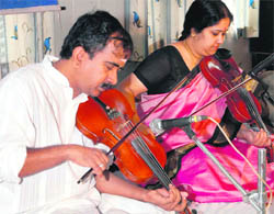 GJR Krishnan gives a performance on the violin at Nishant Public School in Karnal.