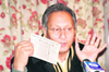 Major Vijay Singh Mankotia (retd) addresses a press conference at Dharamsala on Thursday.