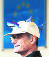A pro-shark activist protests in front of the European Commission headquarters in Brussels on Thursday. EU Commissioner for Fisheries and Maritime Affairs Joe Borg presented the EU Action Plan for sharks.