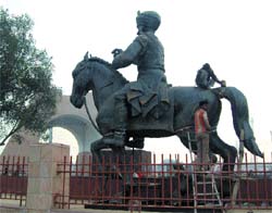Artisans give final touches to the statue of Sikh general Sham Singh Attari at newly constructed Gateway of Amritsar.
