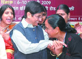 Former IPS officer Kiran Bedi with women from Bihar, Rajasthan, Gujarat and Haryana at a workshop on Women Empowerment and Leadership for Improved Sanitation in New Delhi