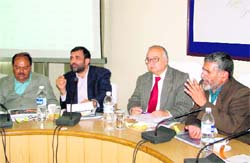 Urban Development Minister Diwakar Bhatt (extreme right) at a meeting in Haridwar on Friday.