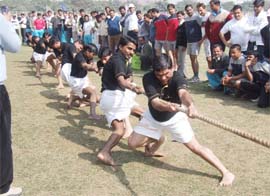 Youths participate in a tug-of-war at Tau Devi Lal Stadium in Sector-38, Gurgaon on Saturday.
