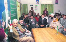  Mufti Mohammad Sayeed addresses PDP workers at the party office in Jammu on Saturday.
