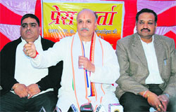 VHP general secretary Praveen Togadia (centre) at a press conference in Ludhiana