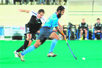 Man-of-the-Match Rajpal Singh charges towards the rival defence in the India-New Zealand match of the Punjab Gold Cup hockey tournament in Chandigarh 