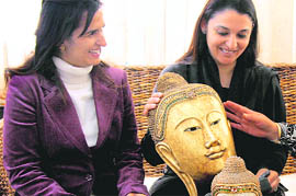 Women have a look at furniture and artefacts exhibited in Ludhiana.