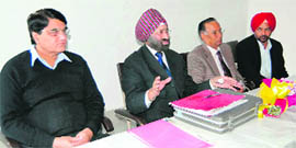 NS Nanda (second from right), founder of New Hope, addresses members during a meeting in Ludhiana on Sunday.