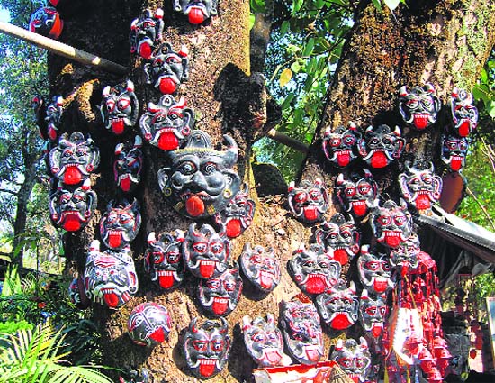 Masks used to ward of evil spirits on sale at the Rajpur Road in Dehradun.