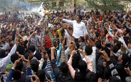 Students of Institute of Technology and Management stage a demonstration at Sector 23 in Gurgaon onTuesday. 