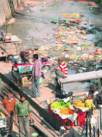 Encroachments on a nullah at Jewel Chowk in Jammu.